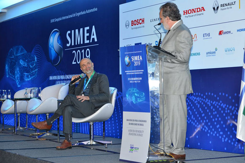Gianni Lopez answers questions about vehicle efficiency after his presentation.